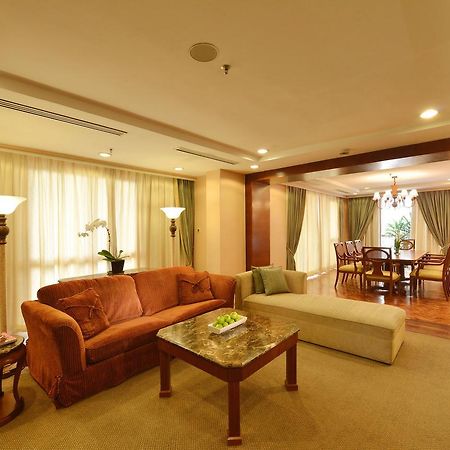 Hotel Equatorial Melaka Экстерьер фото A living room in a suite at the hotel
